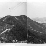 This sat above Lo Wu Camp which is below and to the right. Right center in the gap is the Shum Chun River, the border crossing with mainland China just beyond. Through this gap and along the river ran a road and the Kowloon-Canton Railway. The tracks lead to the OP on this hill. This is typical scenery of the New Territories.