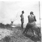 Setting up the calibration base, Sergeant Hale standing, Sergeant Mason observing, Ian Styles booking the observations