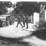 Preparing to depart for Exercise ‘Seek It’. The figure in the center of the three is probably BSM Baglow.